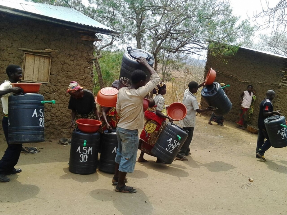 Africans carrying new water filters