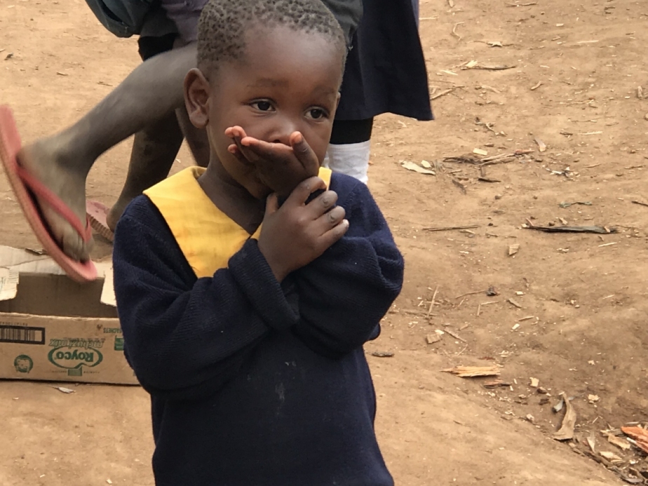 boy in Liberty School uniform